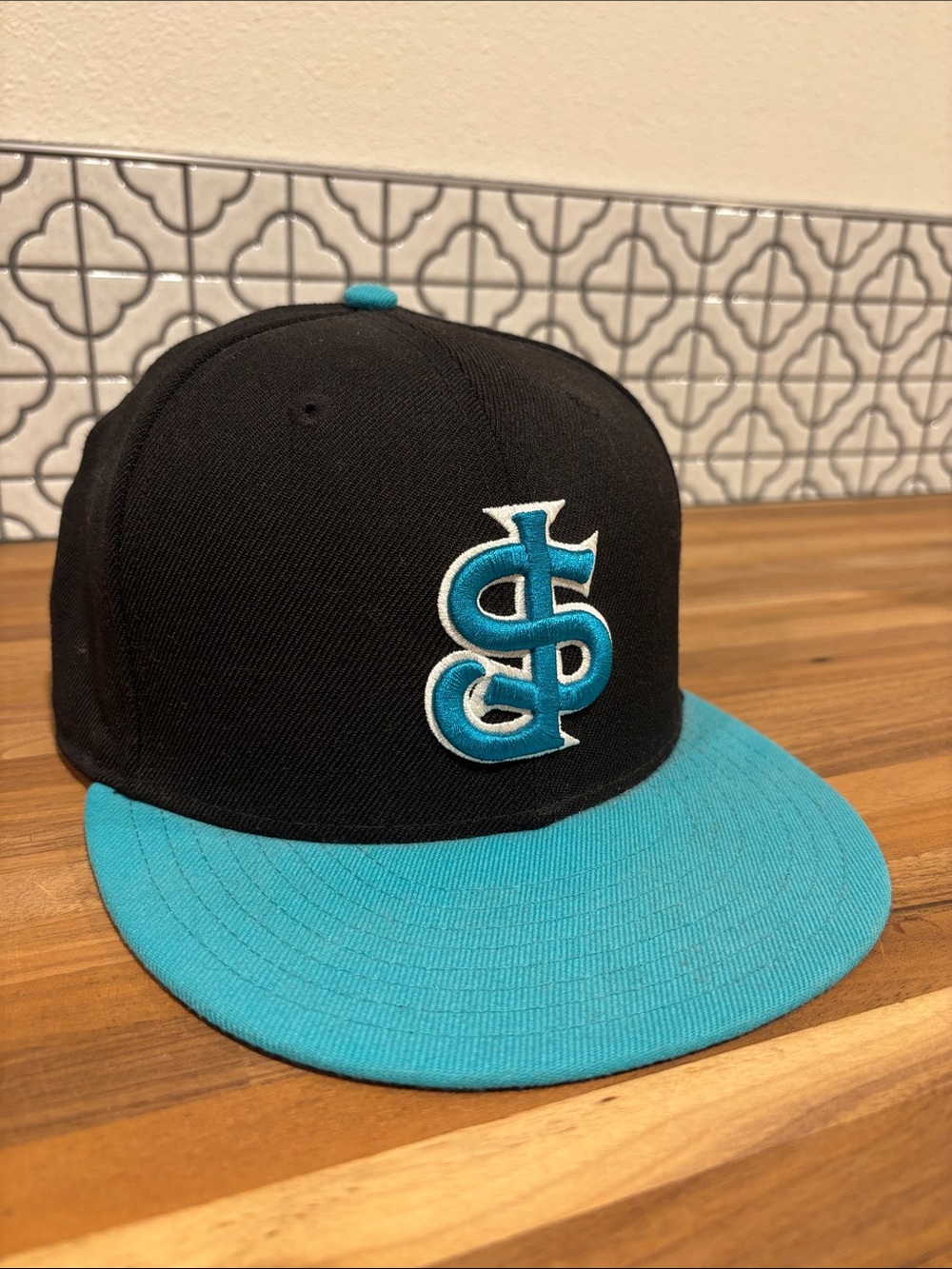 San Jose Giants Black and Teal Baseball Cap with Embroidered SJ logo
